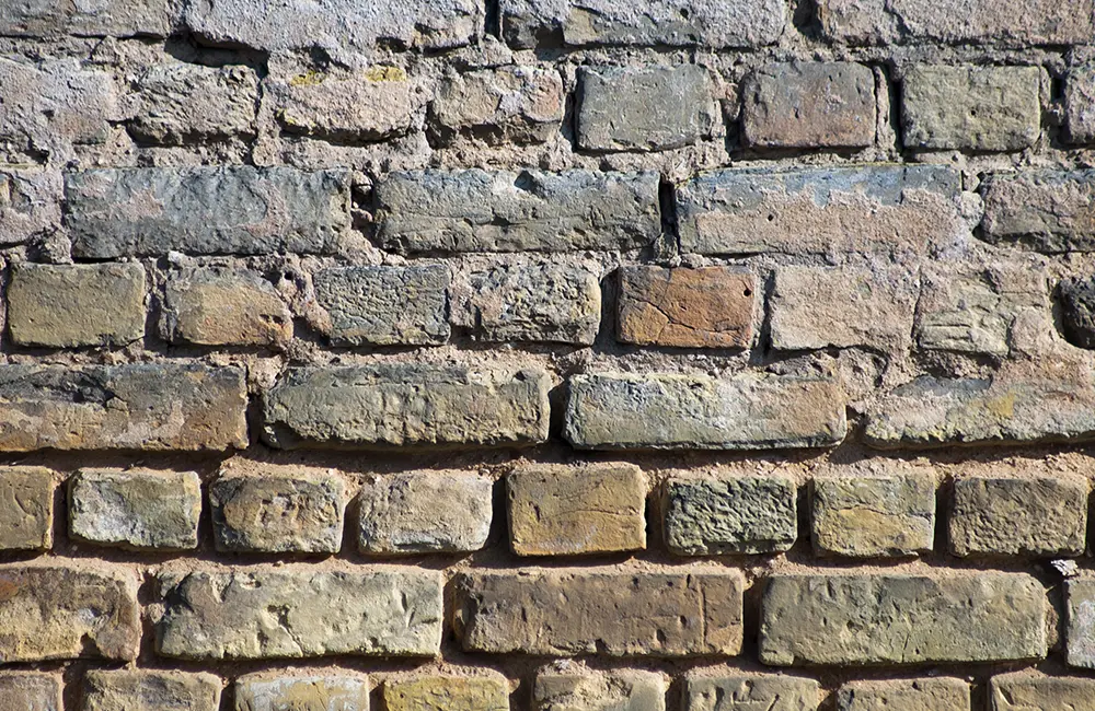 Déjointoyage d'une façade